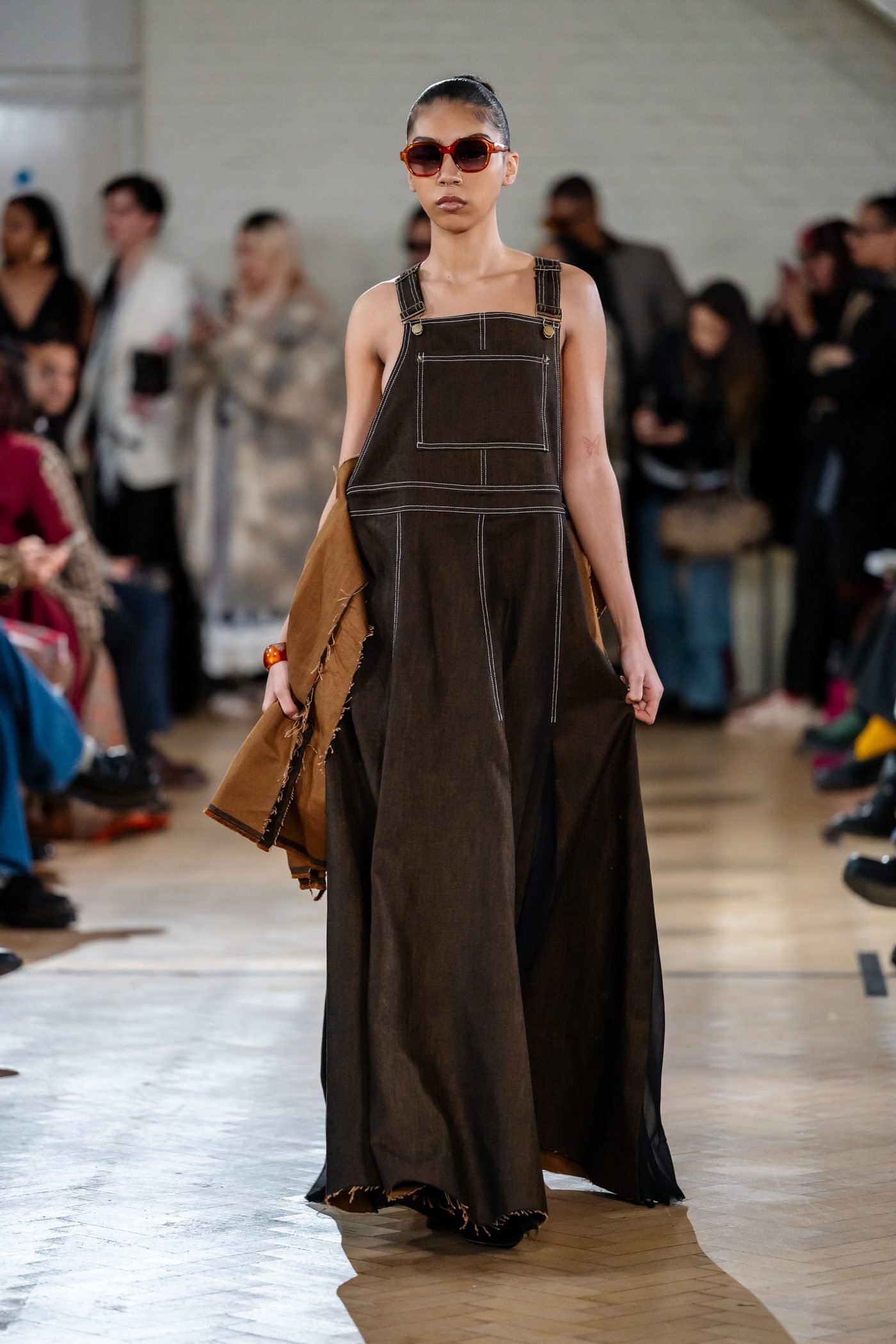 Earth tone overall runway look from Tanvir Mahidy AW26