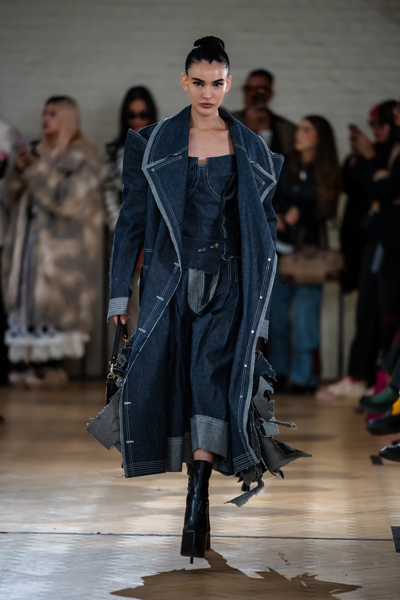 Indigo sculptural runway coat from Tanvir Mahidy AW26